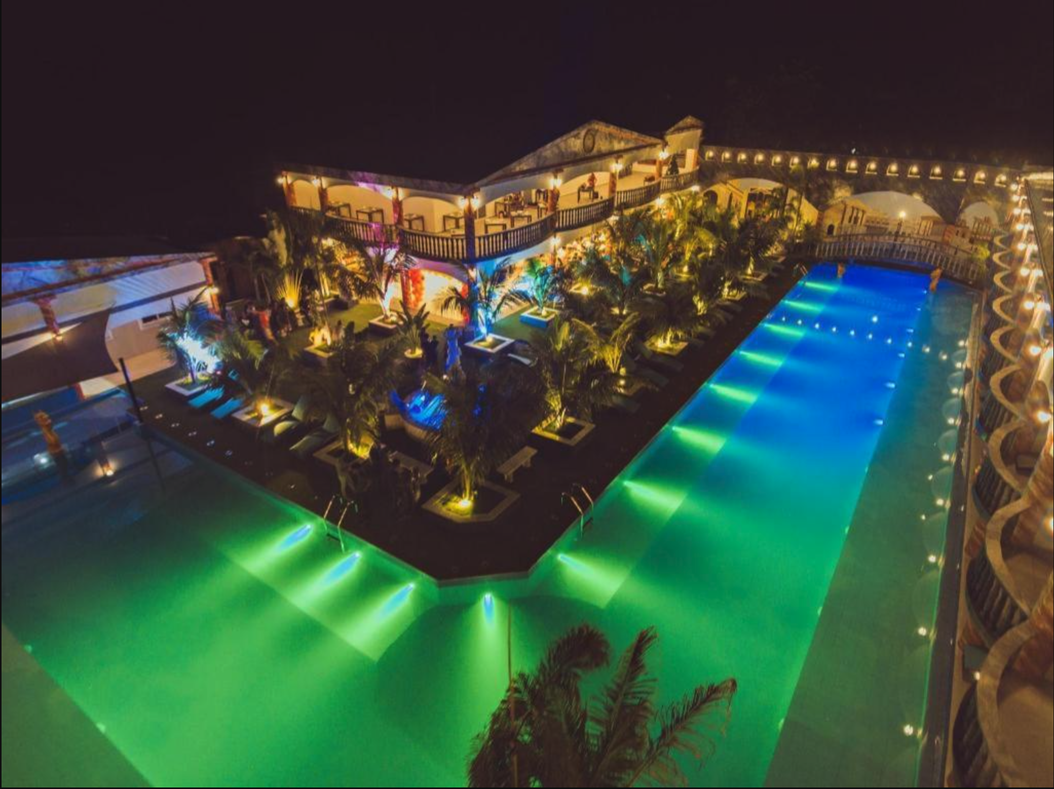Upscale poolside bar at a Panglao resort at dusk.
